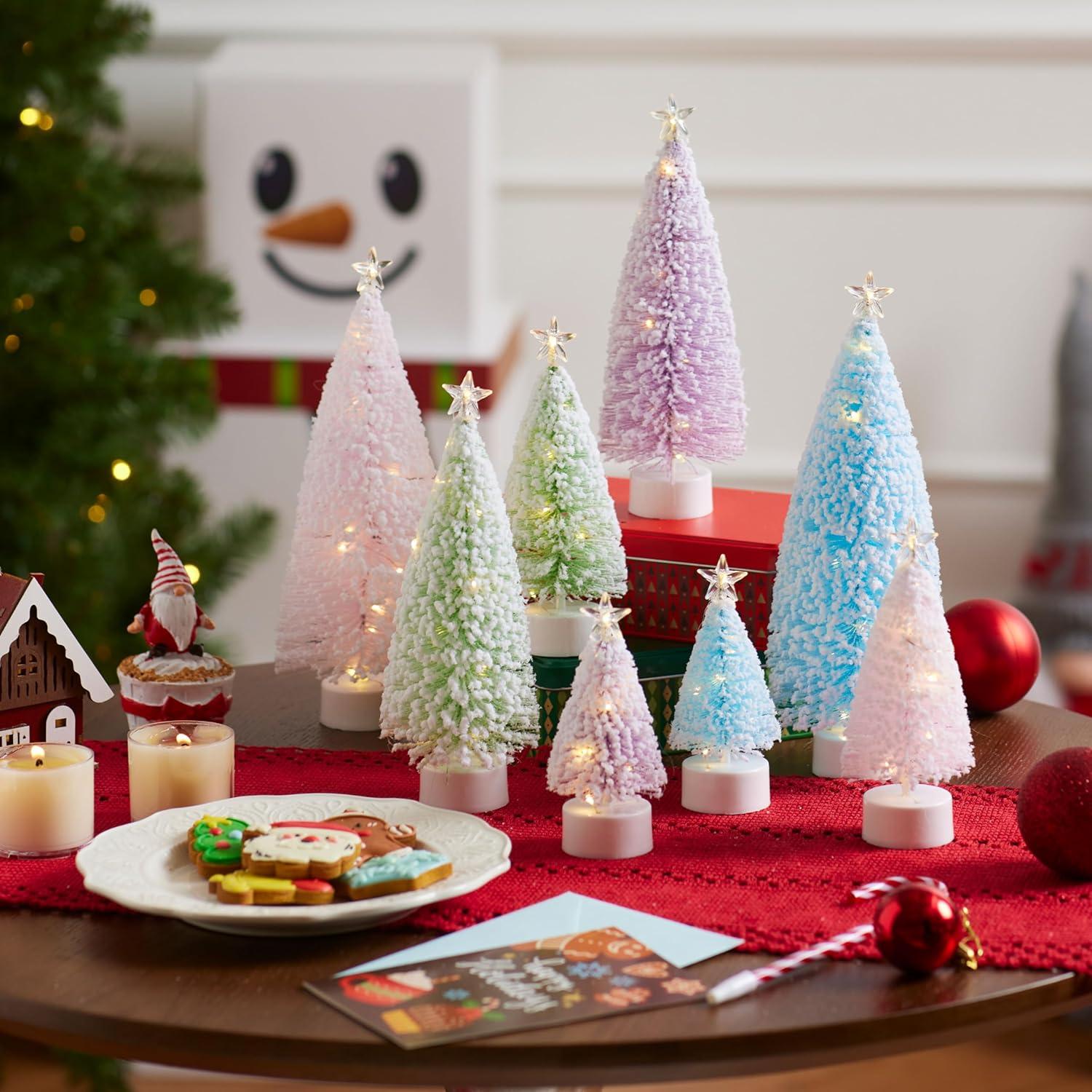 imageJOYIN 8 Pcs Small Xmas Trees with LED Lights Flocked Miniature Christmas Tree in 4 Sizes Mini Tabletop Artificial Pine Tree with Snow with Star Topper for Indoor Decor Holiday Festive Gifts Pastel