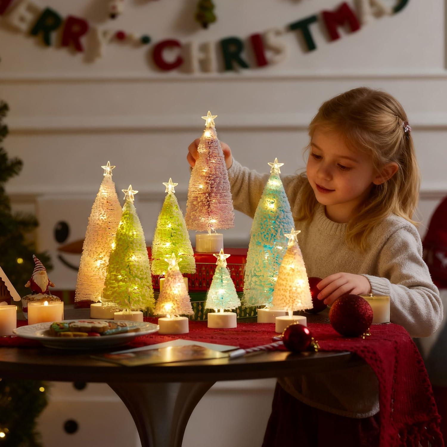 imageJOYIN 8 Pcs Small Xmas Trees with LED Lights Flocked Miniature Christmas Tree in 4 Sizes Mini Tabletop Artificial Pine Tree with Snow with Star Topper for Indoor Decor Holiday Festive Gifts Pastel